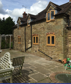 Picture showing PVCu window installation in keeping with house style