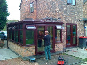 Conservatory-brown-UPVC-Telford-Shropshire-West-Midlands-secure-opening-windows-and-doors